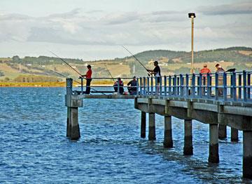 Trying your luck at fishing off the Shelly Beach pier