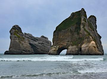 Hole in the rock at Wharariki Beach