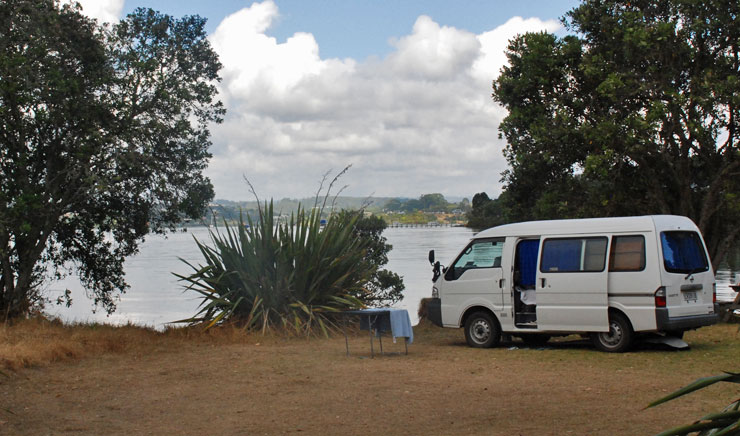 Van parked by the water in a non-powered site