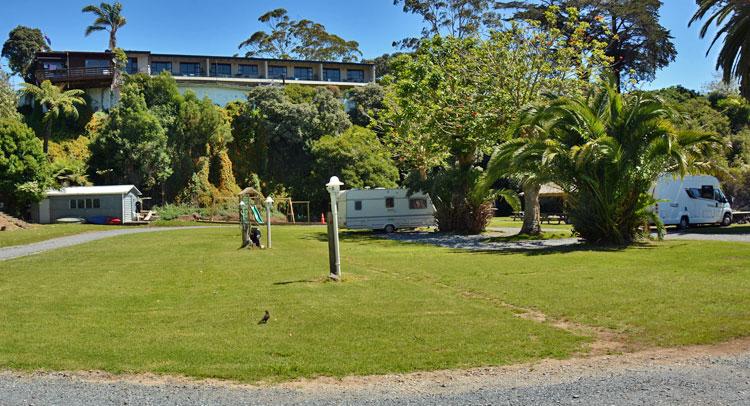 The campground with the motel building in the background