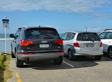 The designated overnight parking area occupied by cars