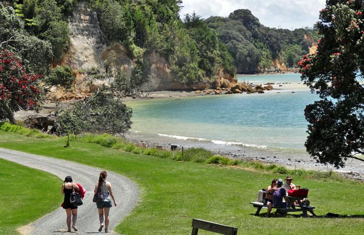 Walking along the beach at Tapapakanga