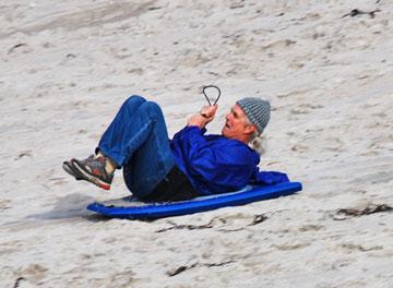 Who cares about age when you can slide down a sand dune!