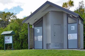 Public toilets with a noticeboard on the lake's history