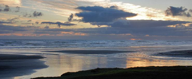 Suggestion of a sunset at Karioitahi Beach