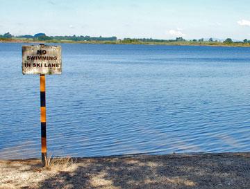 No swimming in ski lanes sign