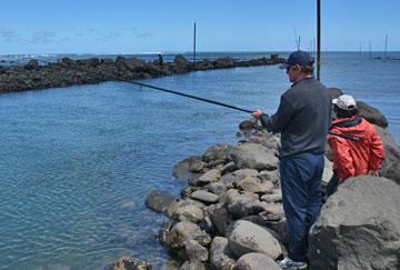 Doing some fishing in the boat ramp accessway