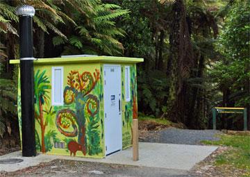 Colorful public toilet at the parking area