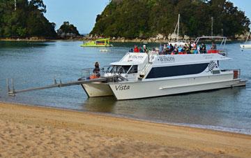 tour boat arriving with passengers