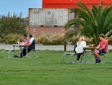 Eating and chatting outside with friends