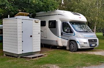 Powered site with shower and toilet chalet