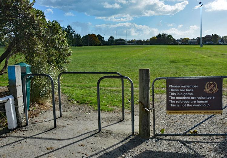 Entrance to the sports ground - with advisory sign...