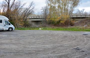 Parking by the river bridge