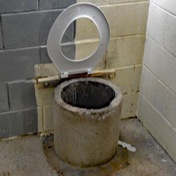 Clean long drop toilet