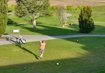 Teeing off on the green