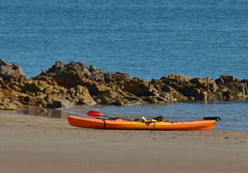 Kayak waiting on the beach